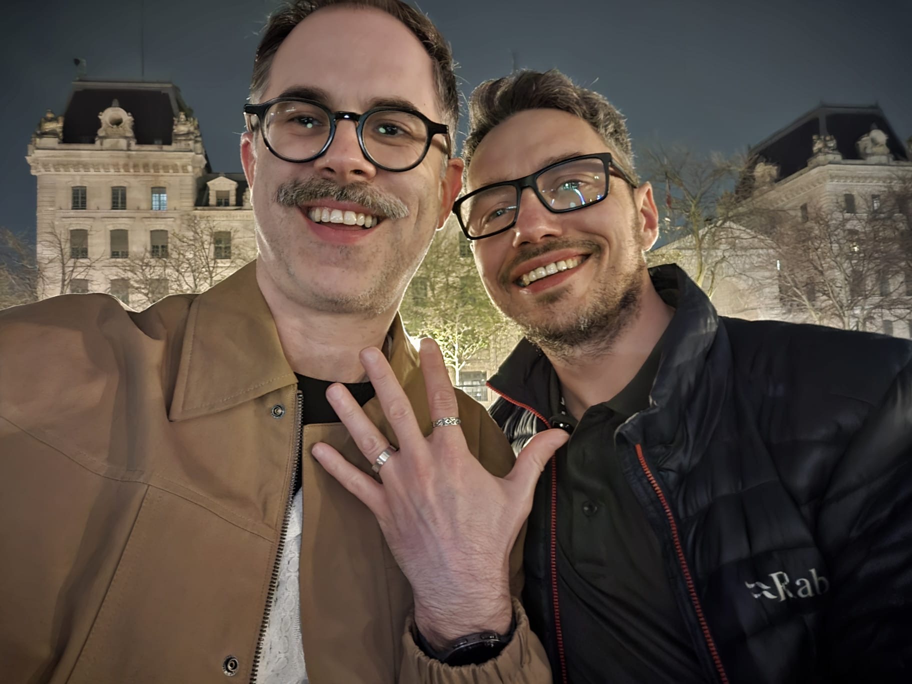 Martin and Simon showing their rings on the day they got engaged in Paris
